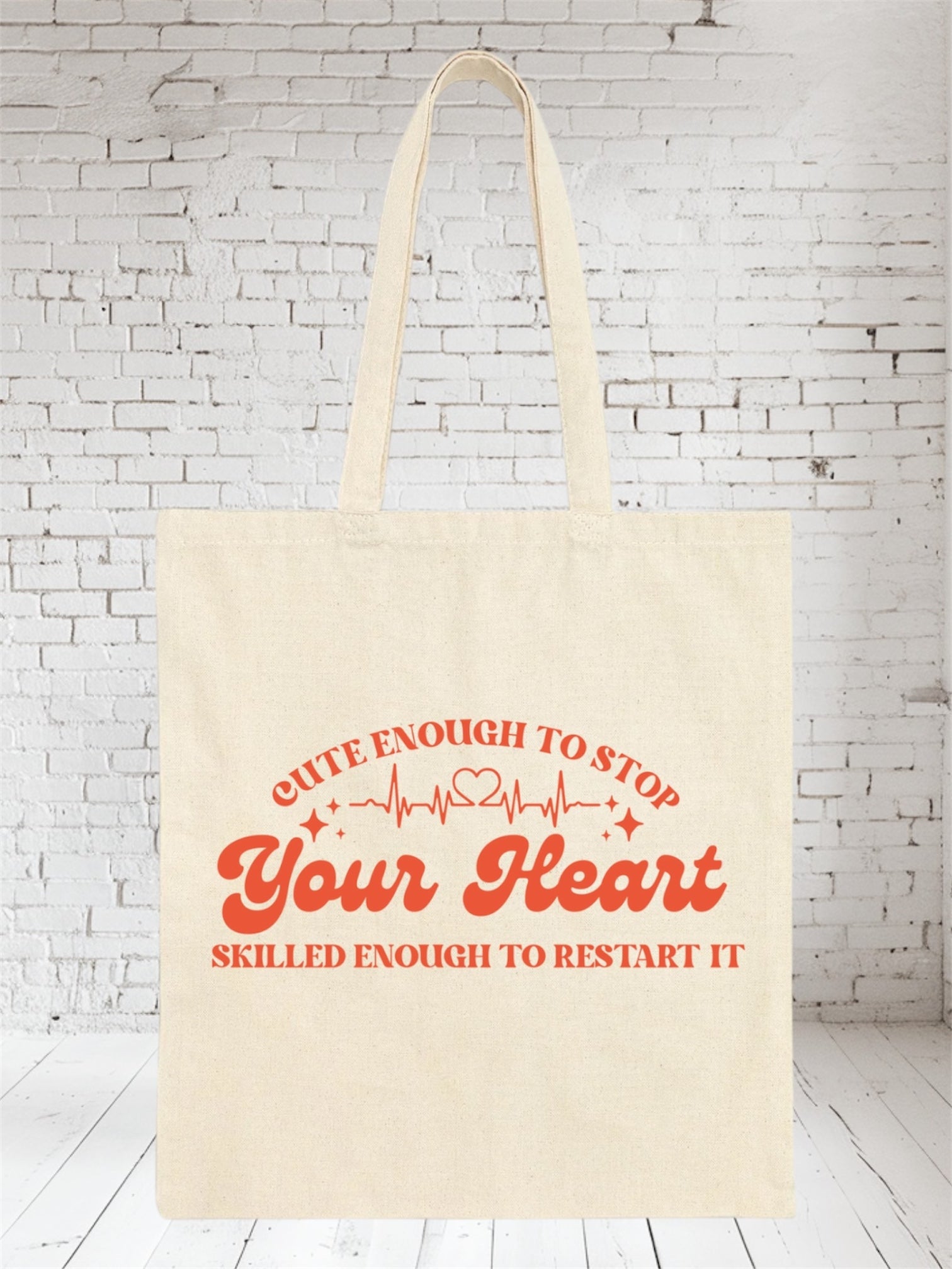Beige canvas tote bag with red text, nurse bag, doctor bag