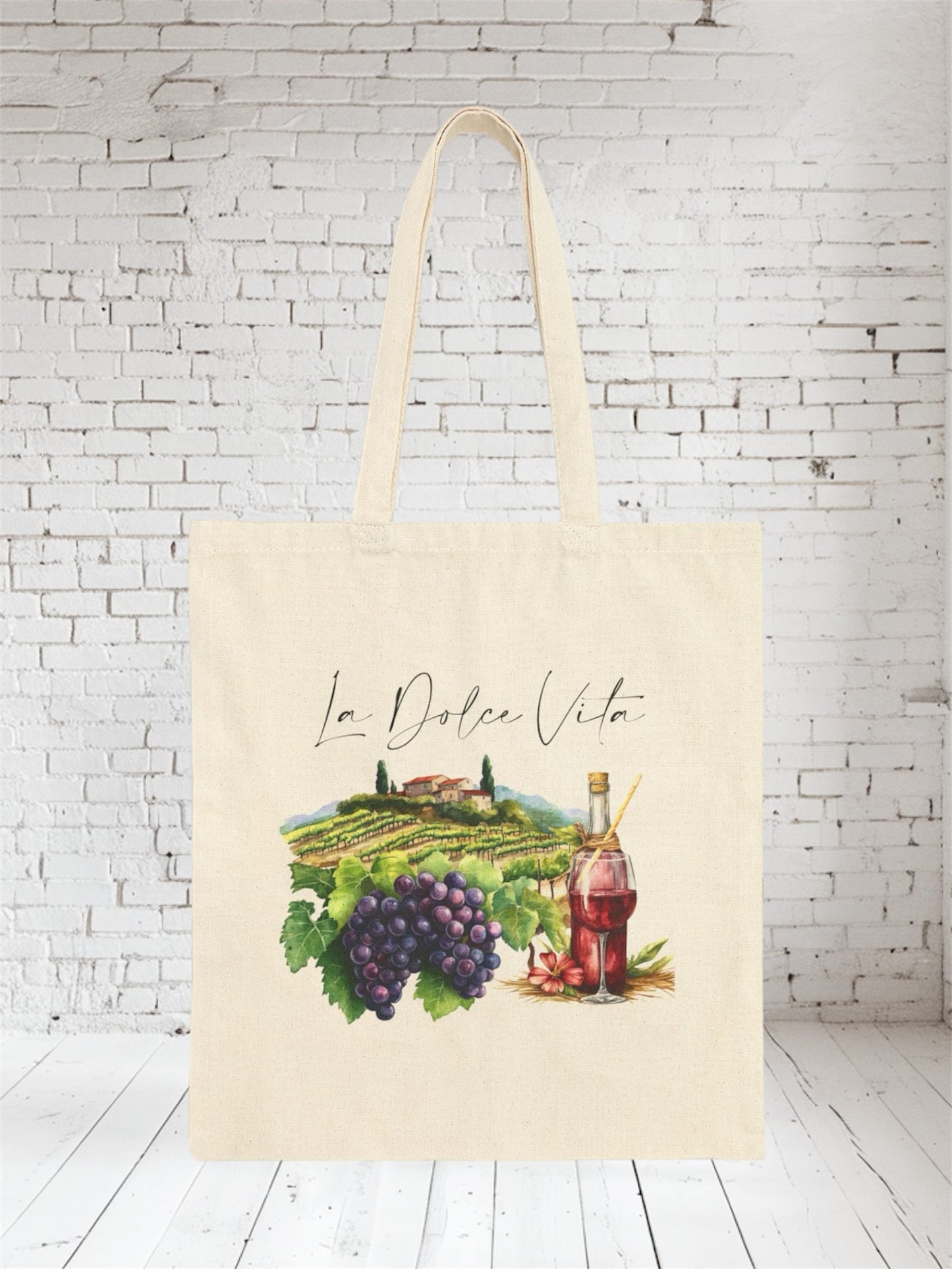 Beige cotton / canvas tote bag with 'La Dolce Vita' text featuring a vineyard and wine bottle